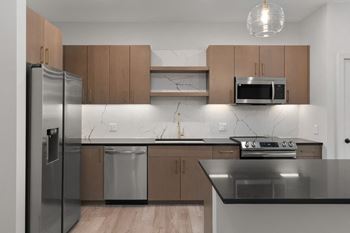 Kitchen with black countertop